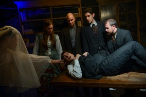 Megan Kohl, Amanda Drinkall, Michael Tipeli (lying down), Kyle Gibson, John Taflan, and John Ferrick in GREAT EXPECTATIONS at Strawdog Theatre.