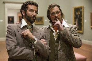 Bradley Cooper and Christian Bale in Columbia Pictures' AMERICAN HUSTLE