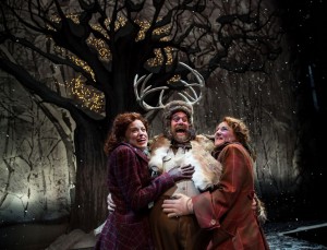 Mistress Ford (Heidi Kettenring), Sir John Falstaff (Scott Jaeck) and Mistress Page (Kelli Fox) meet in Windsor’s woods for nighttime revels in Chicago Shakespeare Theater’s production of The Merry Wives of Windsor, directed by Artistic Director Barbara Gaines.