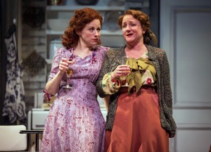 Best friends and confidantes, Mistress Ford (Heidi Kettenring) and Mistress Page (Kelli Fox) delight in their mischief in Chicago Shakespeare Theater’s production of The Merry Wives of Windsor, directed by Artistic Director Barbara Gaines.