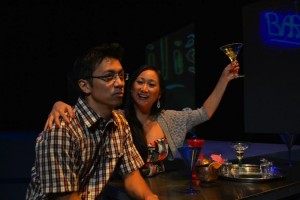 Kennedy Kabasares and Anne Yatco in 'Dallas Non-Stop,' a Playwrights' Arena production at Atwater Village Theatre.