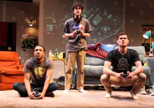 Chuck (Jerry MacKinnon), Ian (Clancy McCartney) and Zander (JJ Phillips) play a game together in Steppenwolf for Young Adults’ production of Leveling Up by Deborah Zoe Laufer, directed by Hallie Gordon.