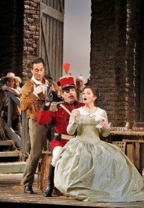 Tenor Giuseppe Filianoti (Nemorino), baritone Malcolm Mackenzie (Belcore) and soprano Tatiana Lisnic (Adina) in San Diego Opera's THE ELIXIR OF LOVE.