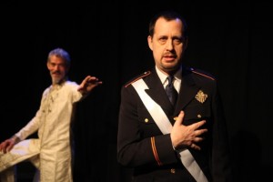 Jeff Paul as POLIXENES (background) and Ethan Cadoff as LEONTES in WorkShop Theatre's THE WINTER'S TALE.