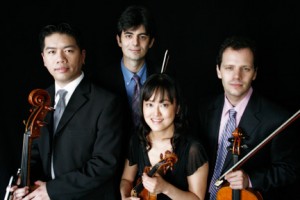 The Avalon String Quartet - Cheng-Hou Lee, cello, Blaise Magniere, violin, Marie Wang, violin (front center), and Anthony Devroye, viola.
