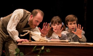 Andrew White, Caroline Heffernan, and John Francis Babbo in Lookingglass's production of IN THE GARDEN, A DARWINIAN LOVE STORY.