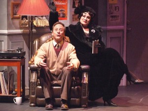 Larry Raben  as Man in Chair and Tracy Lore as the titular THE DROWSY CHAPERONE at the Norris Center.