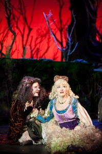 Betts Malone as The Witch beckons Rapunzel (Christanna Rowader) in 3-D Theatricals' INTO THE WOODS.