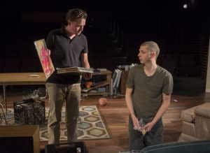 (left to right) Dennis (Kieran Culkin) and Warren (Michael Cera) look through Warren’s record collection in Steppenwolf Theatre Company’s production of This Is Our Youth by Kenneth Lonergan.