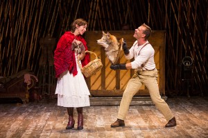 Emily Young as Little Red Ridinghood and Noah Brody as Wolf in Stephen Sondheim and James Lapine's Into the Woods, in a reimagining by Fiasco Theater, directed by Noah Brody and Ben Steinfeld, in a production that originated at McCarter Theatre Center. Into the Woods runs July 12 - Aug. 17, 2014 at The Old Globe. Photo by Jim Cox.