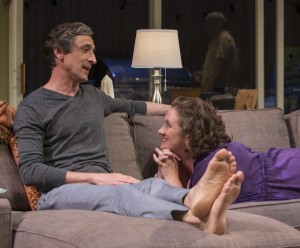 Old friends (left to right) Roger (David Pasquesi) and Deb (Kirsten Fitzgerald) catch up with one another in THE QUALMS at Steppenwolf.