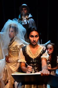 Anu Bhatt (center) as Jane Eyre, with the ghosts that haunt her (L to R) Kyra Morris as Mrs. Reed, Anthony Kayer as Brocklehurst, and Maya Lou Hlava as Helen in Lifeline Theatre’s JANE EYRE