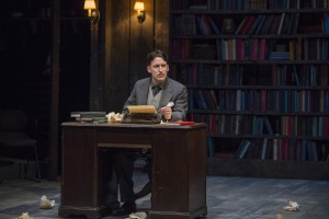 Man (Will Allan) reframes writing as a weapon in Steppenwolf Theatre Company’s production of ANIMAL FARM, a world premiere adaptation by Althos Low, directed by Hallie Gordon.