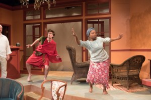 Neibert (Matt Thinnes) joins Ama (Elana Elyce) in a traditional African dance, in Eclipse Theatre's production of “Mud, River, Stone” by Lynn Nottage, directed by Andrea J. Dymond.