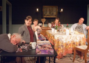 Barbara Apple (Janet Ulrich Brooks, second from left) is torn about the family's plans for uncle Benjamin Apple (Mike Nussbaum, left), but her siblings Jane Apple Halls (Mechelle Moe, from left), Marian Apple Platt (Juliet Hart) and Richard Apple (David Parkes) are there to support her in TimeLine Theatre's Chicago premiere of Sorry, Part 3 of Richard Nelson's The Apple Family Plays, directed by Louis Contey, presented on an alternating schedule with Part 1, That Hopey Changey Thing, at 615 W. Wellington Ave., Chicago, January 13 - April 19, 2015. Photo by Lara Goetsch.