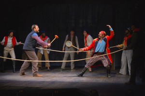 Slank (Will Springhorn Jr.) and Black Stache (Patrick Kelly Jones) duel in the TheatreWorks production of PETER AND THE STARCATCHER playing December 3, 2014 - January 3, 2015 at the Lucie Stern Theatre in Palo Alto. Photo by Keven Berne.