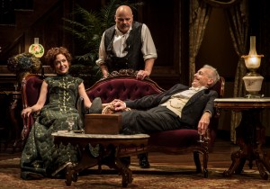 (L to R) Shannon Cochran (Regina Giddens), Steve Pickering (Oscar Hubbard) and Larry Yando (Ben Hubbard) in The Little Foxes by Lillian Hellman, directed by Henry Wishcamper at Goodman Theatre (May 2 – June 7, 2015).