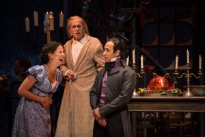 Kristina Valada-Viars (Belle), Larry Yando (Ebenezer Scrooge) and Kareem Bandealy(Young Scrooge)in A Christmas Carol at Goodman Theatre (November 14 – December 27, 2015).