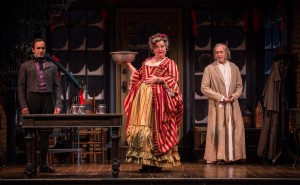 Kareem Bandealy (Young Scrooge), Kim Schultz (Mrs. Fezziwig) and Larry Yando (Ebenezer Scrooge) in A Christmas Carol at Goodman Theatre (November 14 – December 27, 2015).
