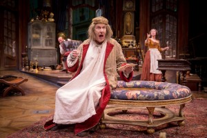 The miserly Geronte (Paxton Whitehead) suffers a host of maladies, overseen by servants Crispin (Cliff Saunders) and Lisette (Jessie Fisher) in Chicago Shakespeare Theater’s production of David Ives’ The Heir Apparent, directed by John Rando, in CST’s Courtyard Theater November 29, 2016–January 17, 2016. Photo by Liz Lauren.