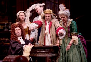 Crispin (Cliff Saunders, at center) impersonates Geronte to sign the will, witnessed by (from left to right) Scruple (Patrick Kerr), Lisette (Jessie Fisher), Eraste (Nate Burger) and Madame Argante (Linda Kimbrough) in Chicago Shakespeare Theater’s production of David Ives’ The Heir Apparent, directed by John Rando, in CST’s Courtyard Theater November 29, 2016–January 17, 2016. Photo by Liz Lauren. 