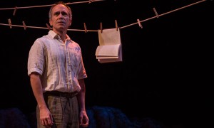 Henry Godinez (Oscar Amalfitano) in “Part II: The Part About Amalfitano” of 2666, based on the novel by Robert Bolaño, adapted and directed by Robert Falls and Seth Bockley at Goodman Theatre (February 6 – March 20, 2016).