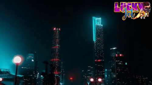 Futuristic cityscape with neon-lit skyscrapers glowing against the night sky.