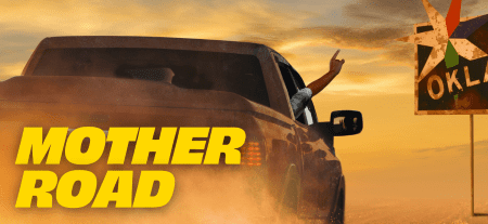 A rugged truck driving at sunset with bold yellow text on the image.