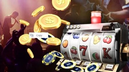 A slot machine with coins and poker chips around it.