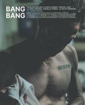 Close-up of a man's chest with a tattoo and the title "Bang Bang" above.