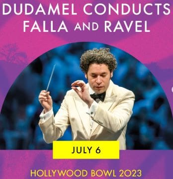 Conductor Dudamel leading an orchestra at Hollywood Bowl 2023.