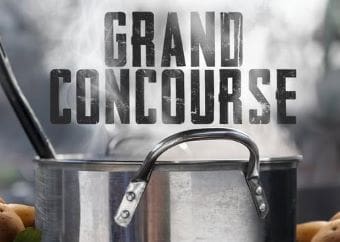 Entrance sign for the Grand Concourse with a lock and key detail.