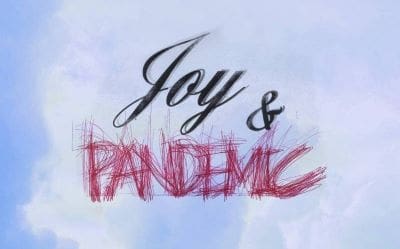 Contrasting words 'Joy' and 'Pandemic' with artistic styles.