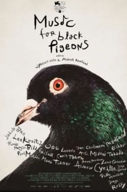 Close-up of a black pigeon with handwritten text around it.