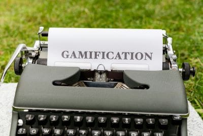 Paper with 'GAMIFICATION' typed on a vintage typewriter.