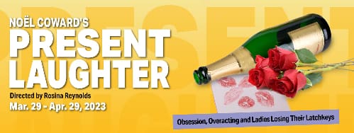 Champagne bottle popping with a splash and lipstick marks on a glass.