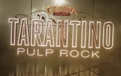 Neon sign reading 'Quarantine Pulp Rock' on a wall.