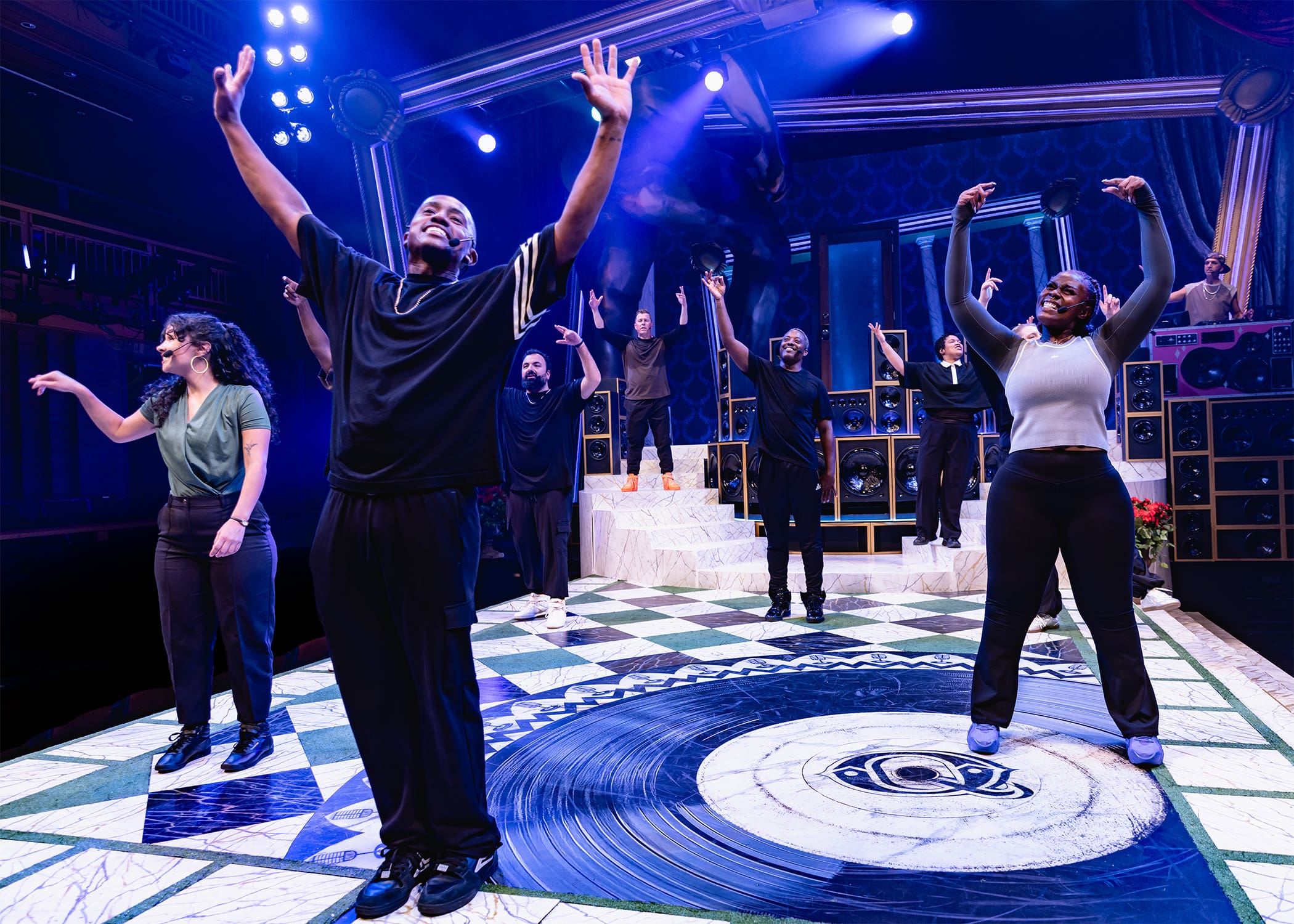 People enthusiastically participating in a group event indoors.