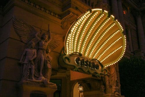 A Casino Sign Lit Up At Night