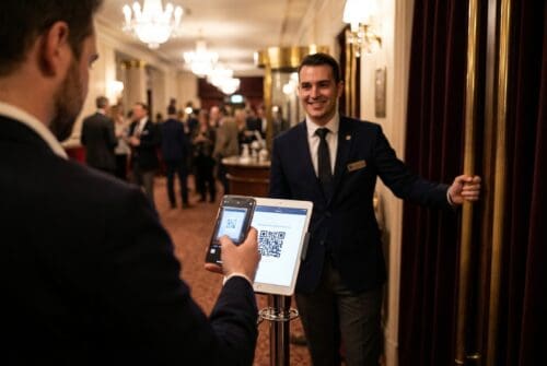 man-scanning-qr-code-at-event-entrance-in-elegant-venue.